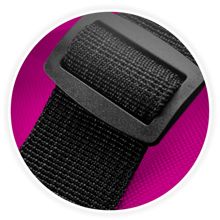 Macro shot of the reinforced plastic rectangular buckle connecting the sturdy black shoulder strap to the tote bag