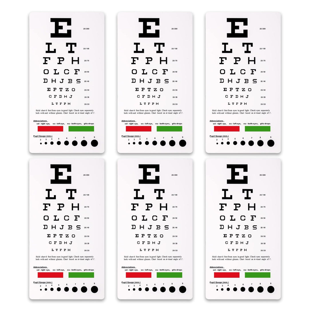 A set of six identical plastic Snellen pocket eye charts arranged in a grid, featuring standard vision testing letters, color bars, and pupil gauge markings