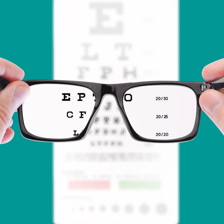 A doctor in a white coat pointing to a specific line on a Snellen eye chart mounted on a wall during a vision examination