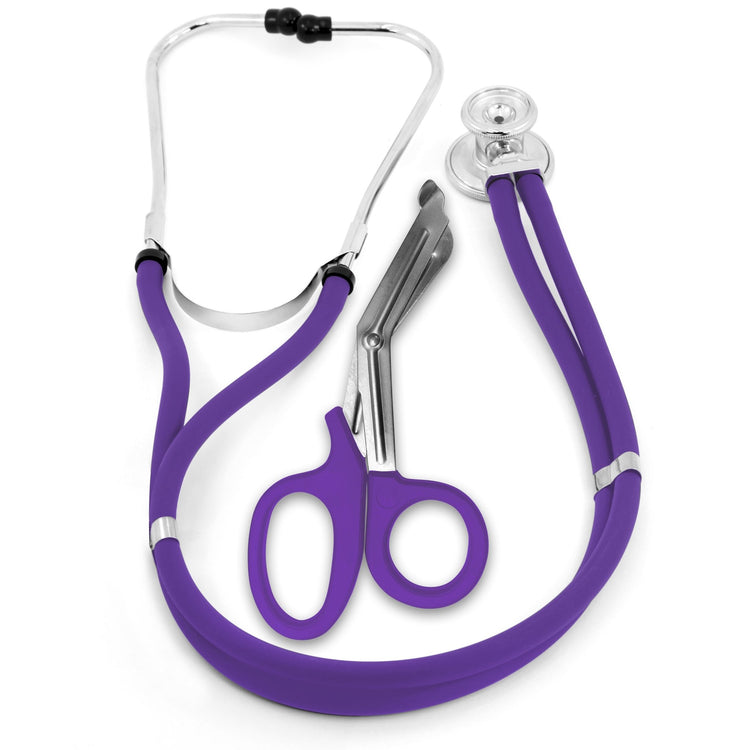A top-down studio shot of a matching medical instrument set. A purple dual-head stethoscope is coiled neatly around a pair of purple-handled trauma shears against a plain white background.