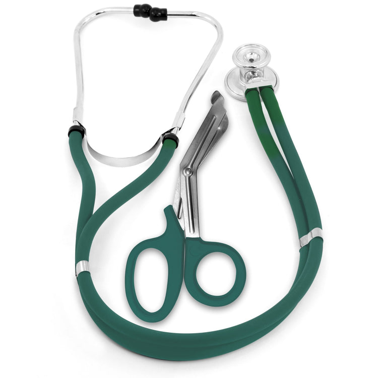 A top-down studio shot of a matching medical instrument set. A hunter green dual-head stethoscope is coiled neatly around a pair of hunter green-handled trauma shears against a plain white background.