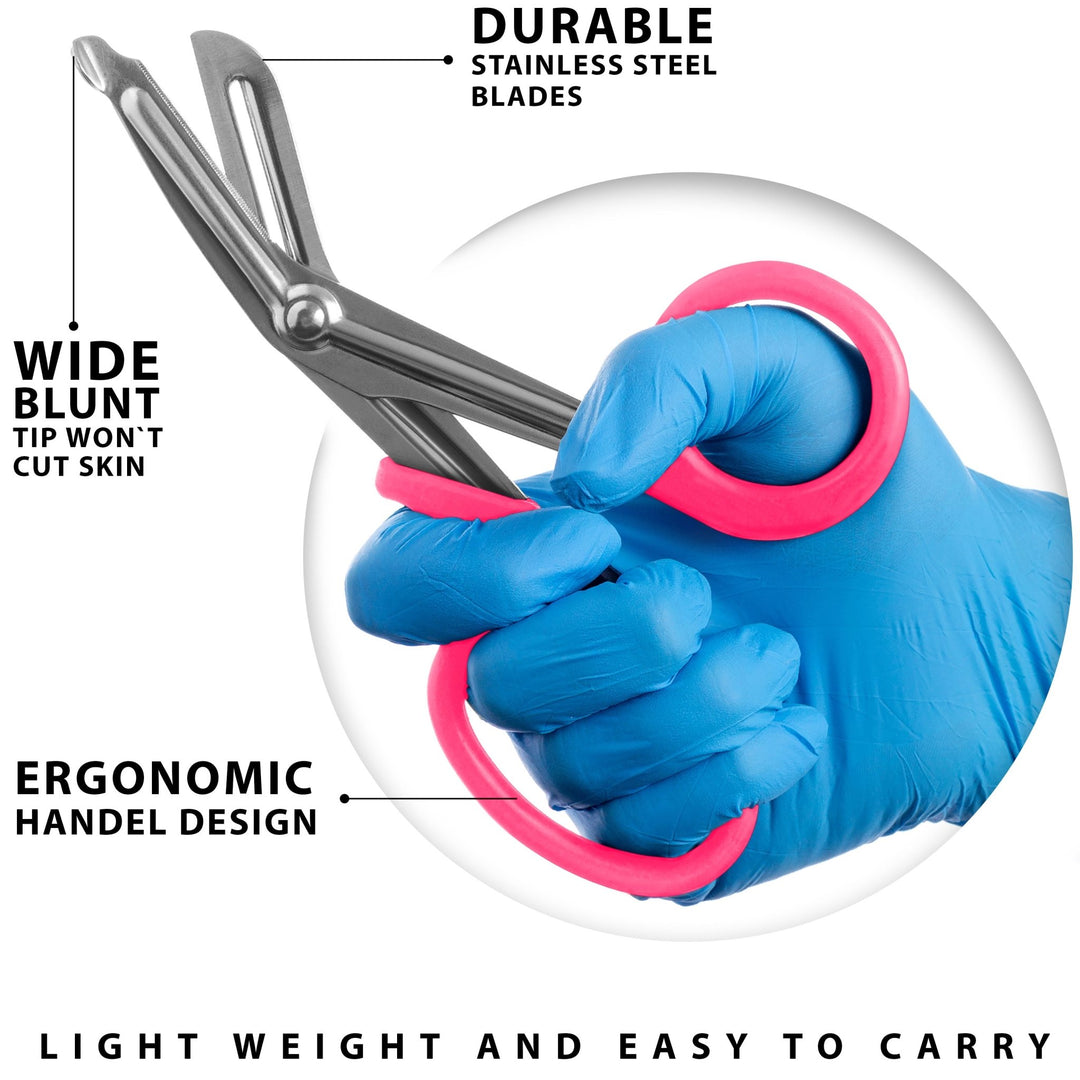 An infographic titled "LIGHTWEIGHT AND EASY TO CARRY" featuring a blue-gloved hand holding the pink trauma shears. Lines point to specific features, labeling them as "Durable Stainless Steel Blades," "Wide Blunt Tip Won't Cut Skin," and "Ergonomic Handle [sic] Design."