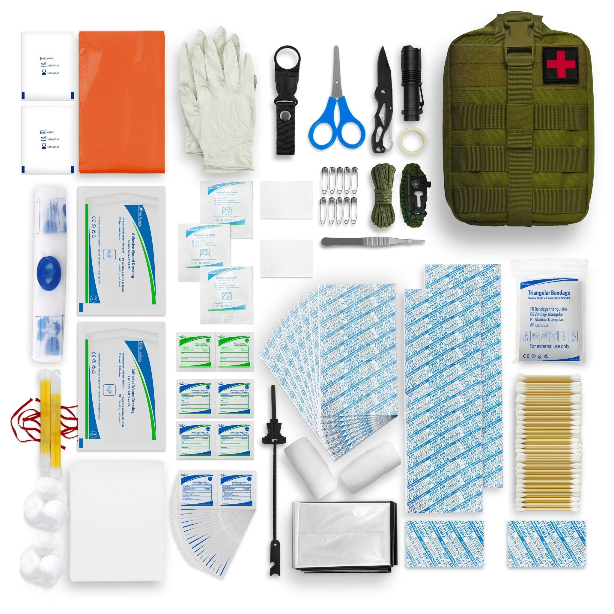 A complete flat-lay overview of the green tactical first aid kit arranged on a white background. The image displays the black MOLLE pouch in the top right, surrounded by its contents: an orange rain poncho, gloves, blue-handled scissors, a folding knife, a flashlight, yellow glow sticks, a silver emergency blanket, triangular bandage, rolls of gauze, and various organized stacks of bandages, wipes, and cotton swabs.