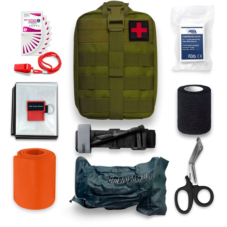 A complete flat-lay overview of the green tactical trauma kit arranged on a white background. Central to the image is the green MOLLE pouch with a red cross patch. Surrounding it are the contents: an orange rolled splint, a silver emergency blanket, a red whistle, a red CPR mask pouch, a fan of antiseptic wipes, a package of compressed gauze, a roll of black self-adherent wrap, a black tourniquet, stainless steel shears, and a vacuum-sealed emergency bandage.