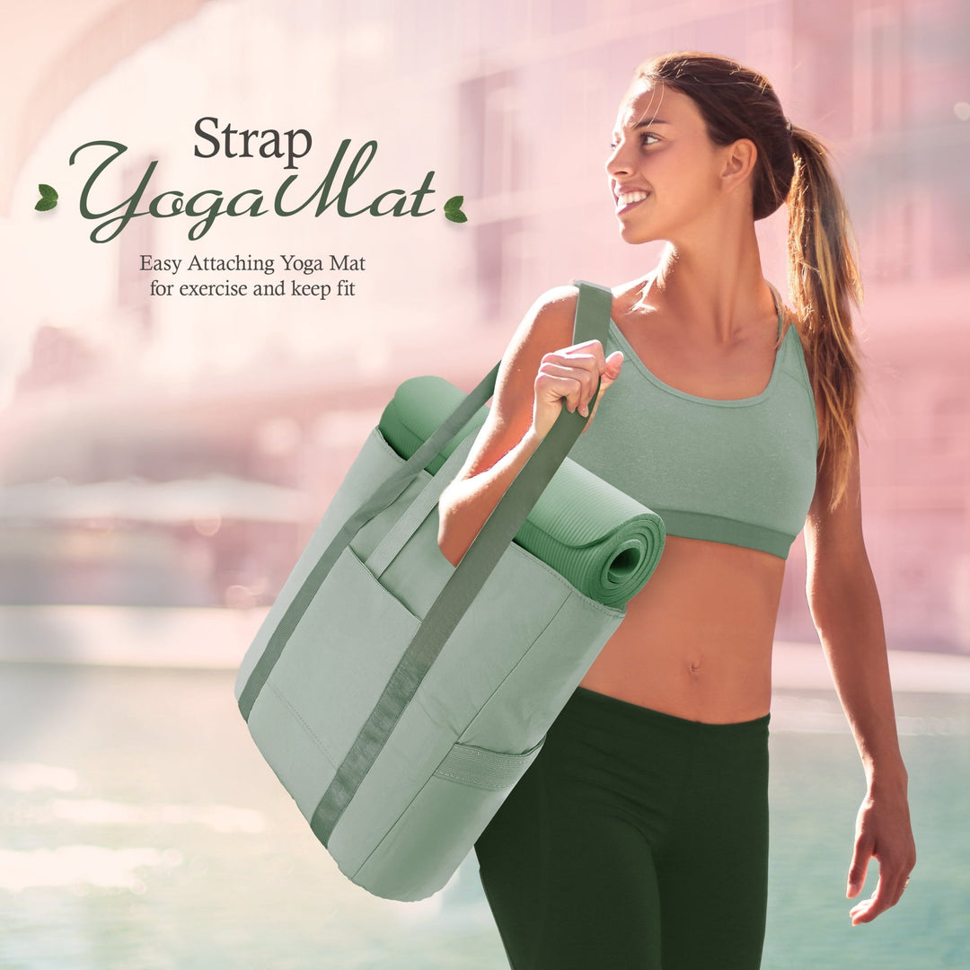 A lifestyle shot of a smiling woman in athletic wear carrying the light green tote bag on her shoulder. A rolled light green yoga mat is secured horizontally through the bag's straps. Text reads, "Strap Yoga Mat: Easy Attaching Yoga Mat for exercise and keep fit."