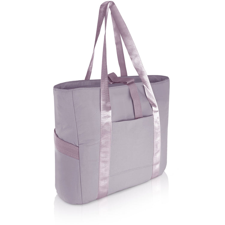 A 3/4 angle studio shot of the empty purple tote bag against a white background. The image displays the dual shoulder straps, the front slip pocket, and the side elastic pockets.